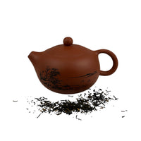 Thé noir de Ceylan avec théière asiatique